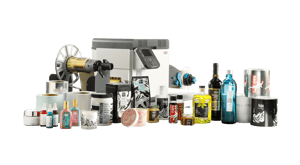 OKI Pro1050 five colour label printer surrounded by printed labels and media rolls